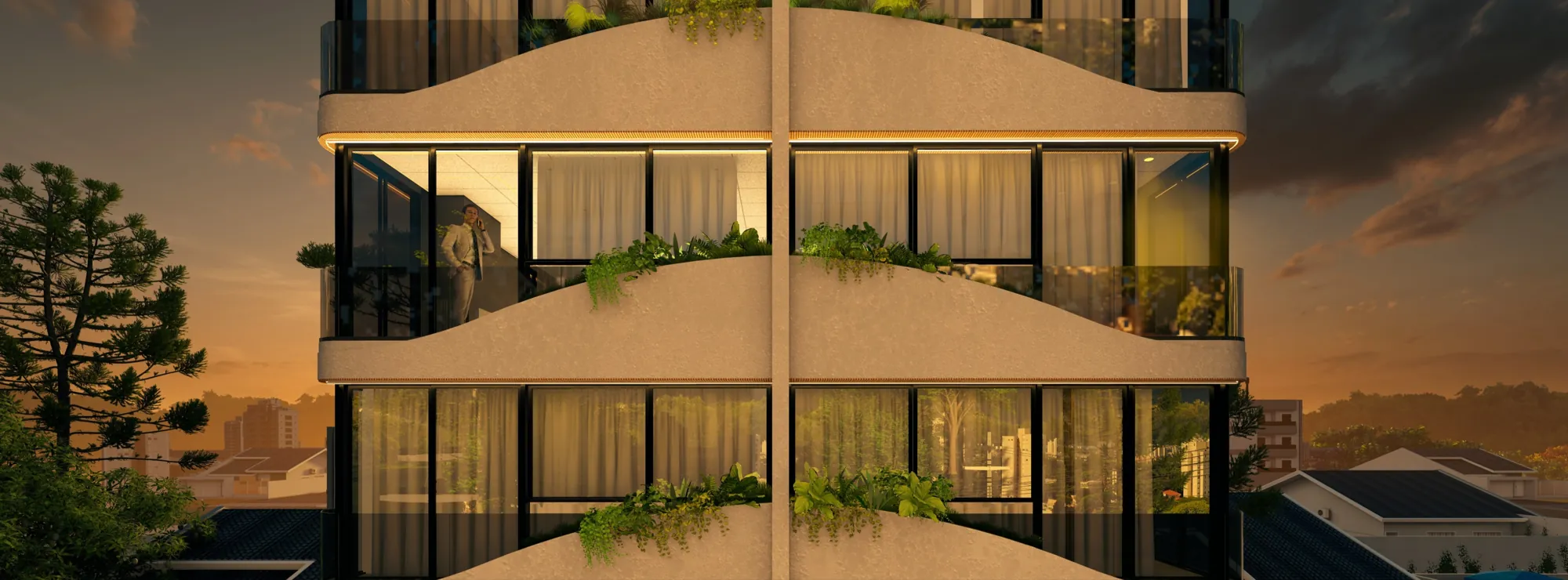 Detalhe das varandas em curva com jardineiras e iluminação ao entardecer